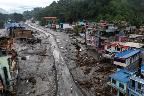 Rescuers search for thousands missing after glacier collapse in Nepal-China region