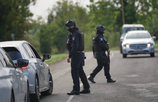 UK police: Five men detained over bomb scare at England airbase are British nationals